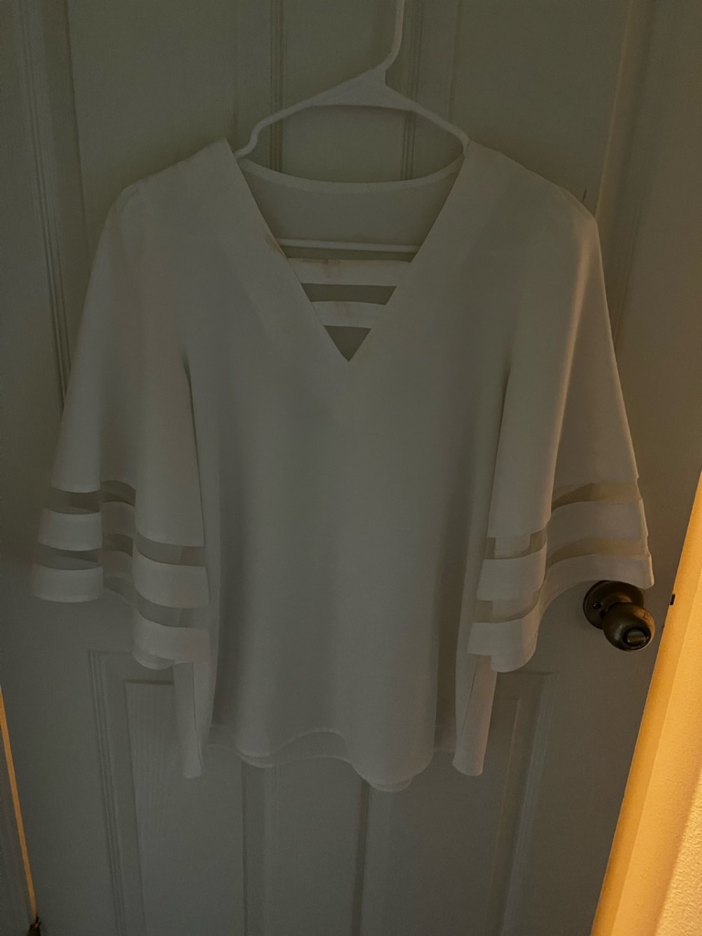 White V-Neck Flutter Sleeve Top with Cutout Detail